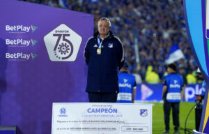 Millonarios Enrique Camacho cheque